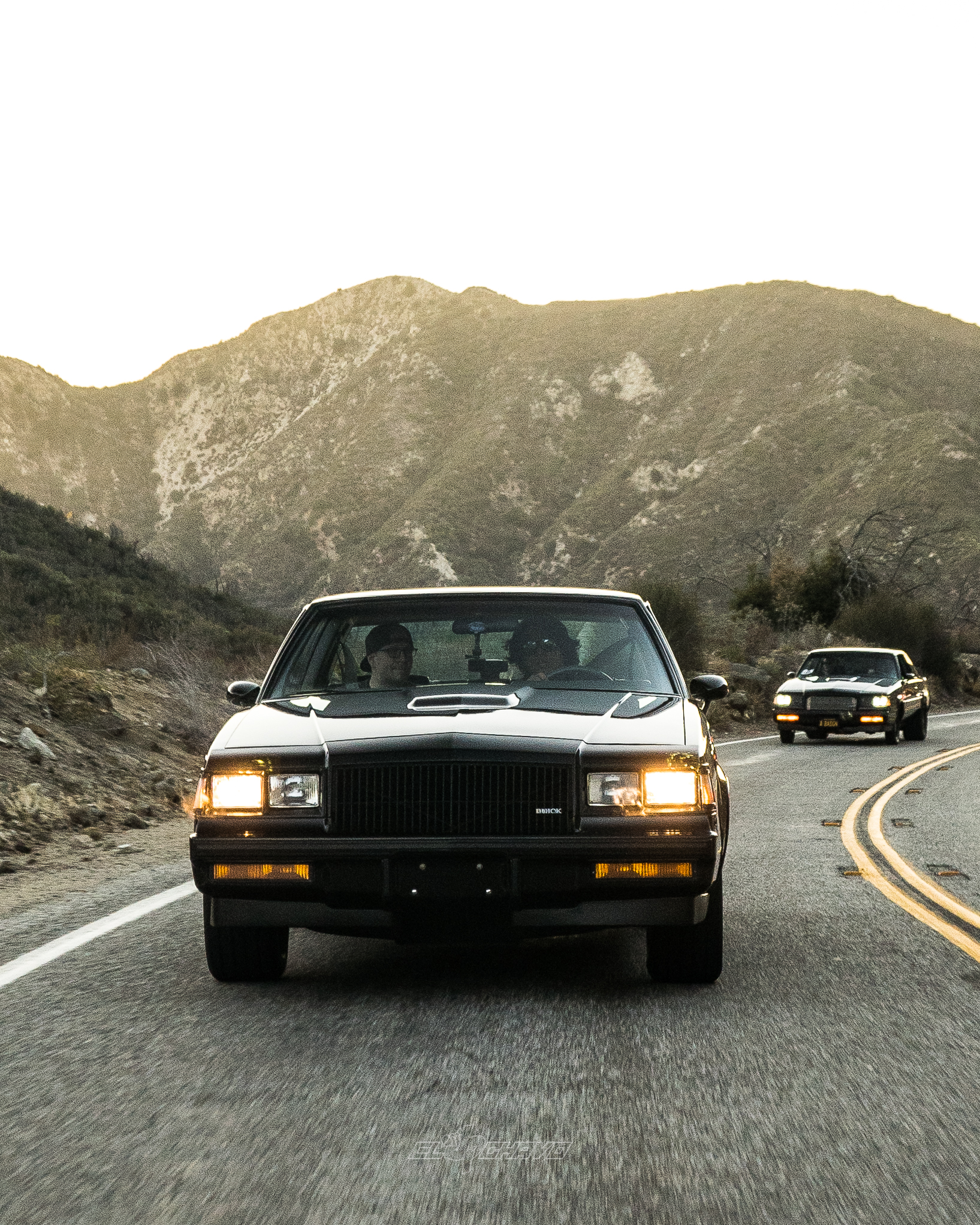 Sung Kang's Buick driving through the mountains